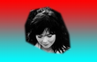 A black & white photo of Bjork is placed against a two tone blue and red background. She is looking towards the ground with a smile on her face.