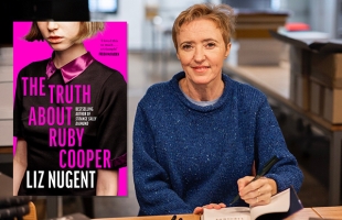 Liz Nugent wearing a blue jumper, smiling at the camera