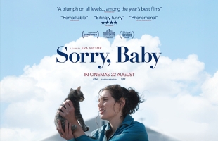Poster for Sorry, Baby. Eva Victor, front and centre, holds a kitten up to the sky