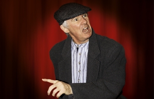 Robert Gogan dressed as Bloom on stage