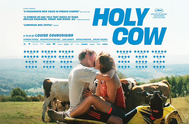 Poster for Holy Cow. A young couple sit on a motorbike, kissing in the middle of a field. Behind them, multiple cows can be seen.