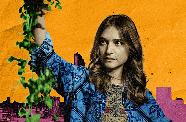 A young Persian woman, wearing a highly patterned shirt, holds up a bunch of herbs