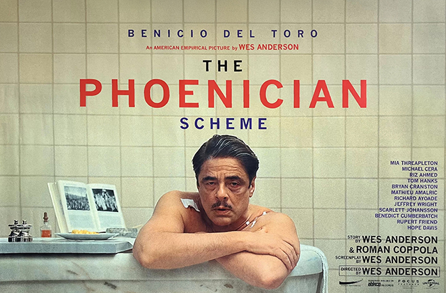 Poster for The Phoenician Scheme. Benicio Del Toro leans over the side of a bath with a black eye, cut lip, and a bandage on his right shoulder.