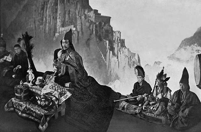 A historical photograph of the Tashi Lhunpo monks in ceremonial dress.