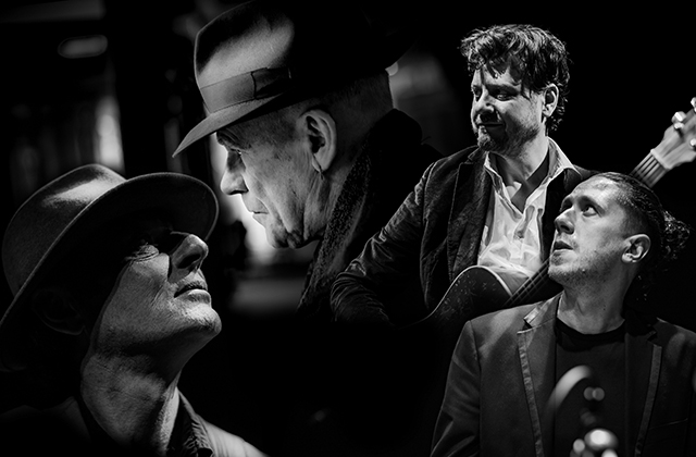 Black and white collage image of Steward D'Arietta wearing a fedora, surrounded by his bandmates.