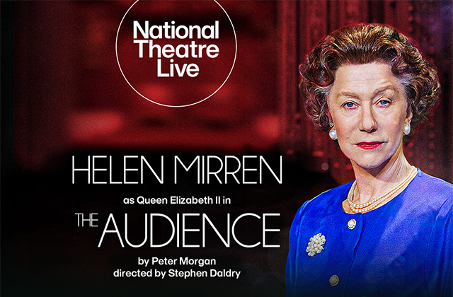 Helen Mirren dressed as Queen Elizabeth II with a curly wig, blue top and pearl accessories looks at the camera in front of a red backdrop