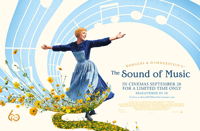 Poster for The Sound of Music. Julie Andrews, dressed in a black dress and gingham pinafore, with arms outstretched, with flowers surrounding her