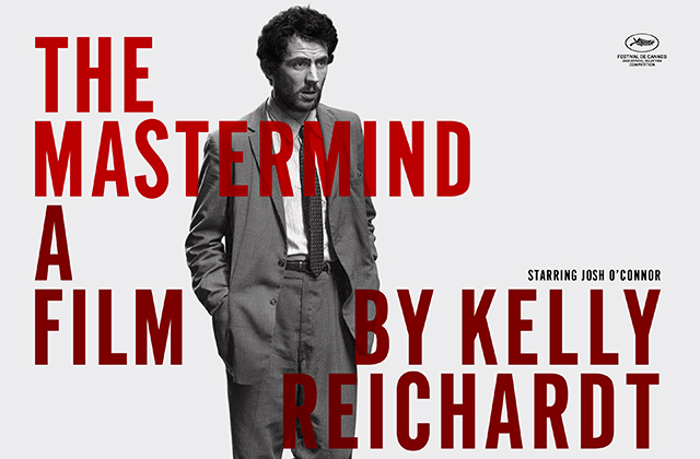 Poster for The Mastermind. Josh O'Connor, dressed in an ill-fitting suit stands with his shoulders slumped.