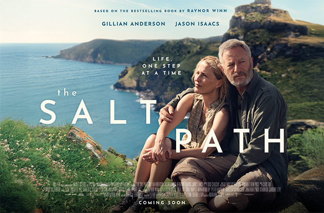 Poster for The Salt Path. An older couple sit with their arms around each other atop a mountain, overlooking a cove